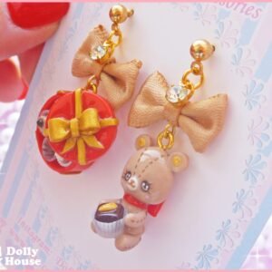 Choco Bear Earrings with beige bows, a bear holding a chocolate and a red heart-shaped box of chocolates — additional view 1