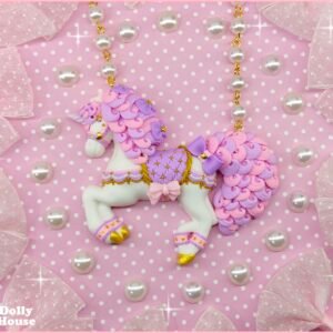 Candy carousel unicorn necklace with a lavender saddle and pink bows on a pearl-accented chain